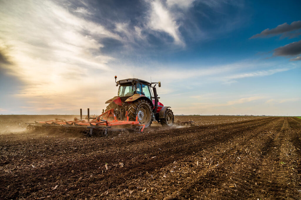 Tractor ploughing field